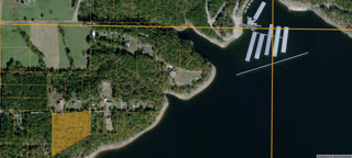 Aerial view of the 6.58-acre Bay Shore Estates property showing the approximate boundary and shoreline along Greers Ferry Lake
