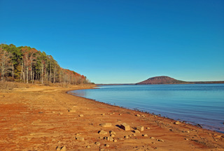 Sandy beach along Greers Ferry Lake at Fairfield Bay